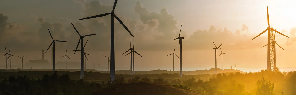 Wind turbines at sunset