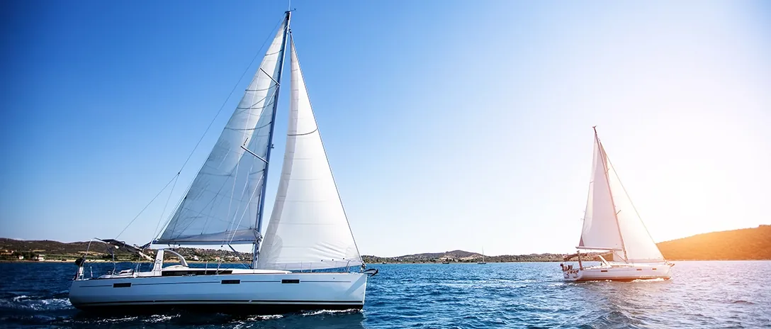 Sailing yachts on open water
